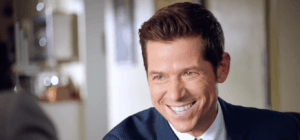 Man smiling to show off his teeth