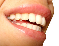 Close-up of woman's front and bottom teeth