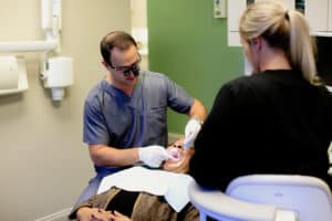 Dentist working on patient with a cracked tooth